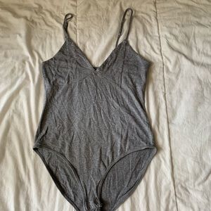 Grey body suit
